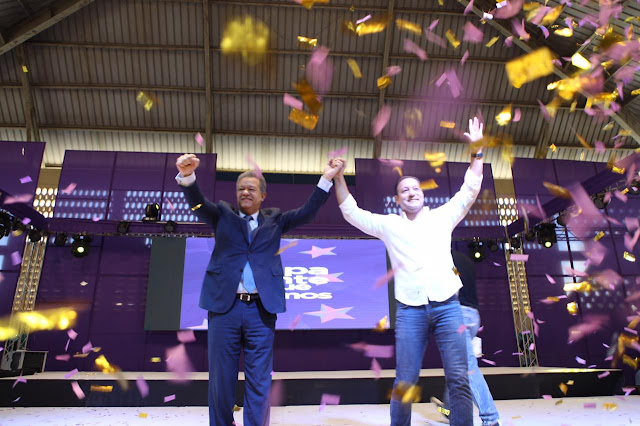 Oposición en República Domincana fortalece alianzas con miras a las elecciones de mayo Logo de RD PLD en fondo blanco.