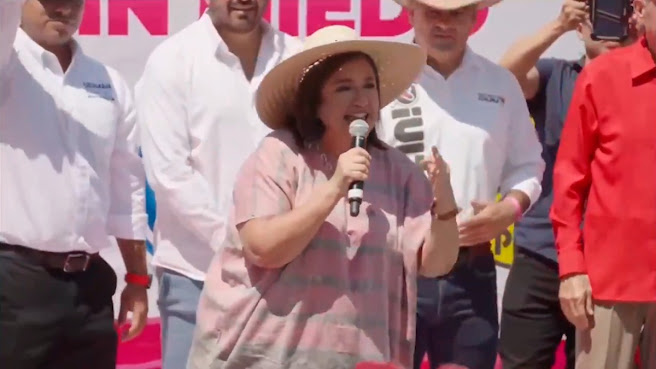 Xóchitl Gálvez amenaza con revelar las ‘mentiras’ de Sheinbaum en debates Atardecer sobre paisaje montañoso.