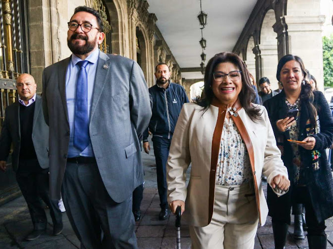 Clara Brugada invita a Ulises Lara a sumarse a su administración tras concluir su cargo en la FGJCDMX Imagen de un paisaje urbano moderno.